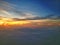 Traveling trough Asia, airplane window view, above the clouds