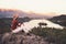 Traveling young woman looking at Bled Lake, Slovenia, Europe