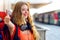 Traveller girl female backpack and tourism outfit at railway station