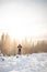 Traveller looks around the snowy landscape. Winter walk through untouched landscape in Beskydy mountains, Czech Republic. Hiking