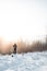 Traveller looks around the snowy landscape. Winter walk through untouched landscape in Beskydy mountains, Czech Republic. Hiking