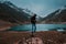 Traveller stand on a rock at Lake Saif Al Maluk in Naran