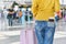 Traveller standing with a luggage at airport terminal, Passenger walking to departure check-in counter.