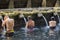 Traveller take a bath at Holy Spring Water Tirta Empul Hindu Temple , Bali Indonesia.