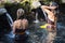 Traveller take a bath at Holy Spring Water Tirta Empul Hindu Temple , Bali Indonesia.