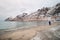 Traveller walks along the popular tourist beach Ersfjord on Senja Island in northern Norway, just above the Arctic Circle. A sandy