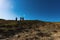 Travellers on mountain slope