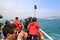 Travellers  standing in front of boats of hong kong