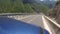 Travelling with off-road vehicle on the curvy mountain highway with 180 degree curve
