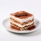 Travertine Cake: Richly Layered Tiramisu On A White Plate