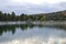 Travertine cliffs by a lake