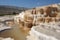 travertine formation, with smooth and shiny surfaces, in natural hot spring