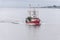 Trawler Double Down crossing New Bedford outer harbor on windless morning