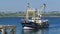 Trawler entering Port, Brixham Devon England