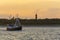 Trawler with tourists passing Hel lighthouse