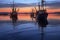 trawlers reflection on calm water during dusk