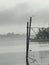 Trawling boat docked in Plaquemines Parish Louisiana on a foggy morning.