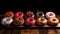 a tray of different types of donuts and strawberries