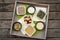 Tray with different types of grains and rice in small bowls