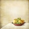 Tray with fruits on a table against a grunge wall