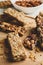 Tray with granola bars and bowl with almond,  close up