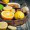 Tray with ingredients for making immunity boosting healthy vitamin drink On dark background