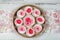 Tray of pink flower blossoms for a spring centerpiece