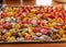 Tray with sliced tomatoes, different colors and shapes, autumn harvest