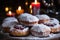 A tray of sufganiyot, a traditional Hanukkah treat that are filled with jelly and dusted with powdered sugar