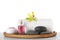 Tray with towel and spa supplies on grey table against background