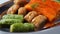 A tray of Turkish pastries including baklava, knafeh -  a Middle Eastern cheese pastry soaked in sweet, sugar-based syrup