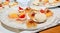 Tray with various canapes at a celebration.