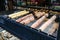 Trdelnik, traditional dessert baked in an open fire wooden stake in Prague Christmas Market.