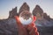 Tre Cime mountain view through crystal glass globe.