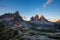 Tre Cime and rifugio hut at sunrise in summer in Dolomites, Italy