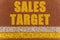 On the treadmill, lines and an inscription - SALES TARGET