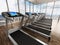 Treadmills inside a sports center in upper floors. 3D illustration