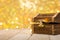Treasure Chest on wooden board with beautiful gold bokeh room for text