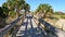 Treasure Island beach POV walking wooden walkway to beach slow