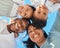 Treasure your family - theyre worth more than you think. Low angle shot of a happy family relaxing together outdoors.