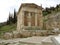 The Treasury of the Athenians on the Hillside of the Archaeological Site of Delphi