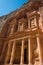 The treasury building carved into the rock face at Petra in Jor