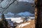 Tree branch with scenic view on hiking village Zell Pfarre (Sele), Austrian Alps, Carinthia (Kaernten), Austria, Europe