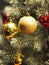 Tree Christ`s Mass Christmas Trimmings Decoration Gift box Colored balls Snow Globe bell Nutcracker Lights