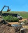 A tree company dump truck at landfill. Copy Space.