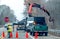 Tree crew works on side of a busy highway