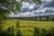 A tree framed view towards the Bennerley Viaduct over the Erewash canal