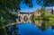 A tree framed view towards the Elvet Bridge in Durham, UK