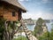 Tree house and Diamond beach in Nusa penida island, Bali in Indonesia. Tree house on cliff with sea view background.