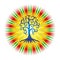 The tree of life against the background of the openwork mandala in bright colorful colors.